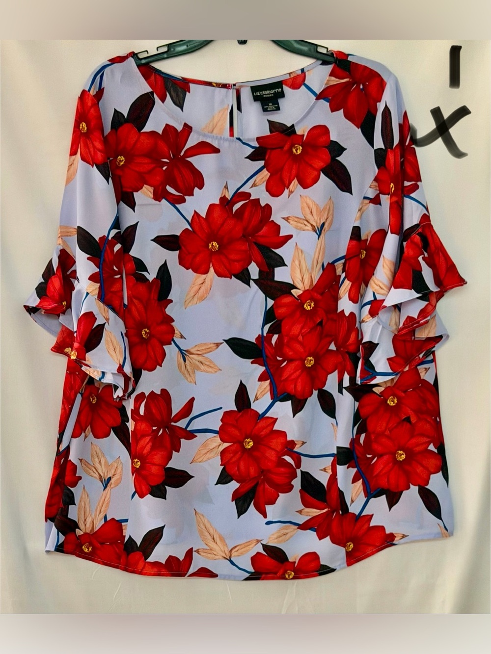 Liz Claiborne Red Floral Ruffle Sleeve Tunic on Light Blue Background